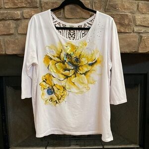 Onque Woman white top with sequin and bedazzled yellow flowers. 1X